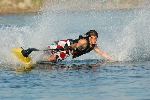 Men riding a jet board